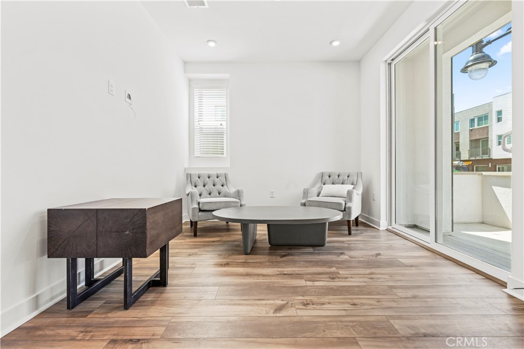 609 South Lyon Street Santa Ana, CA 92705 - Photo 22 of 52 a living room with couch and a table