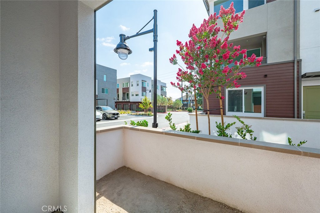 609 South Lyon Street Santa Ana, CA 92705 - Photo 46 of 52 a very nice looking room with a large window and chandelier