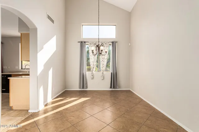 a view of a hallway with windows