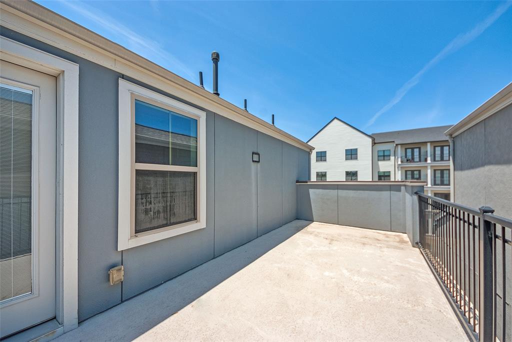 1141 Tea Olive Lane Dallas, TX 75212 - Photo 16 of 18 a view of backyard with a deck and kitchen view