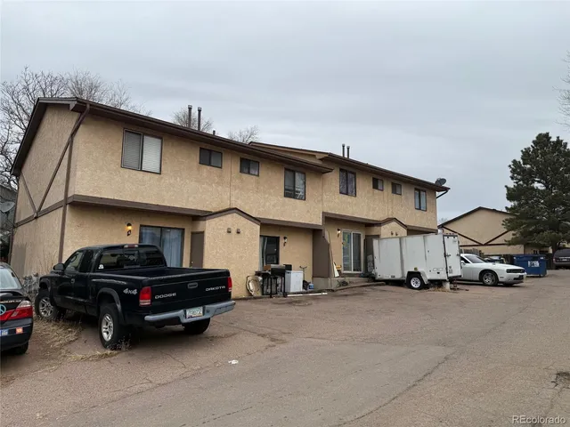 a car parked in front of a house
