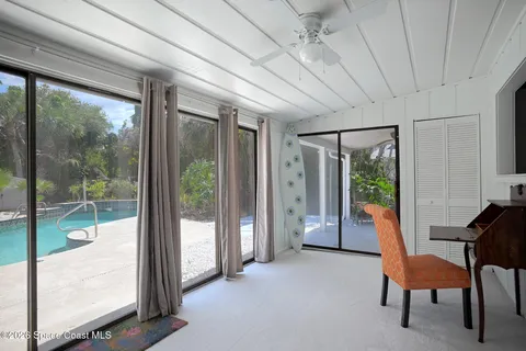 a room with furniture and a large window