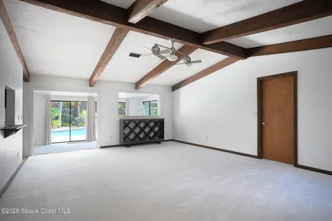 a big room with windows and closet