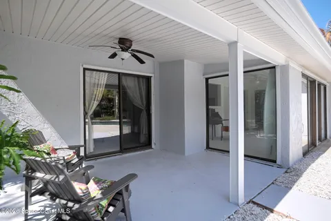 a very nice looking dining room with a large window