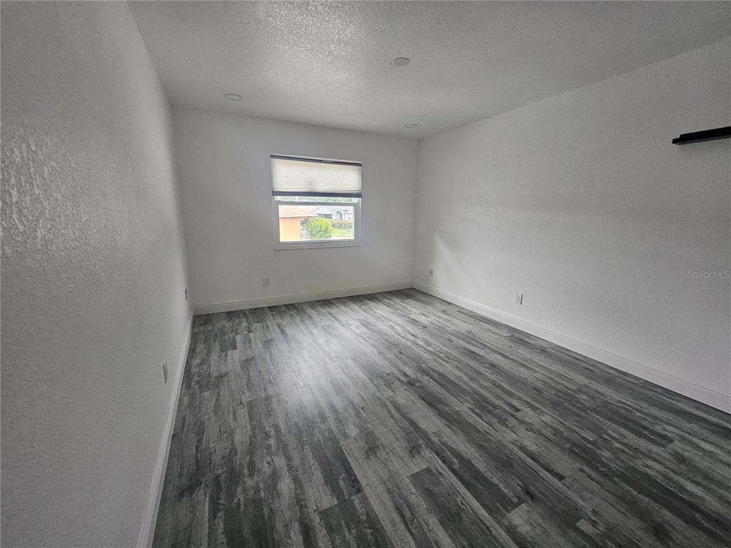5802 Mohr Loop, Unit 5802 5804 5806 5808 Tampa, FL 33615 - Photo 26 of 40 a view of an empty room and window