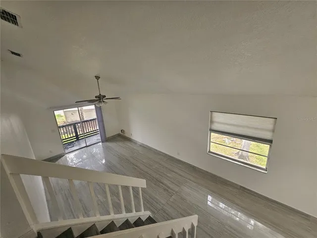 a view of an empty room and window