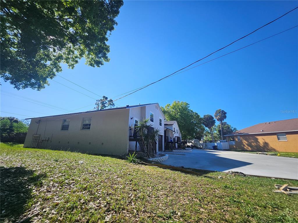 5802 Mohr Loop, Unit 5802 5804 5806 5808 Tampa, FL 33615 - Photo 5 of 40 a view of a backyard
