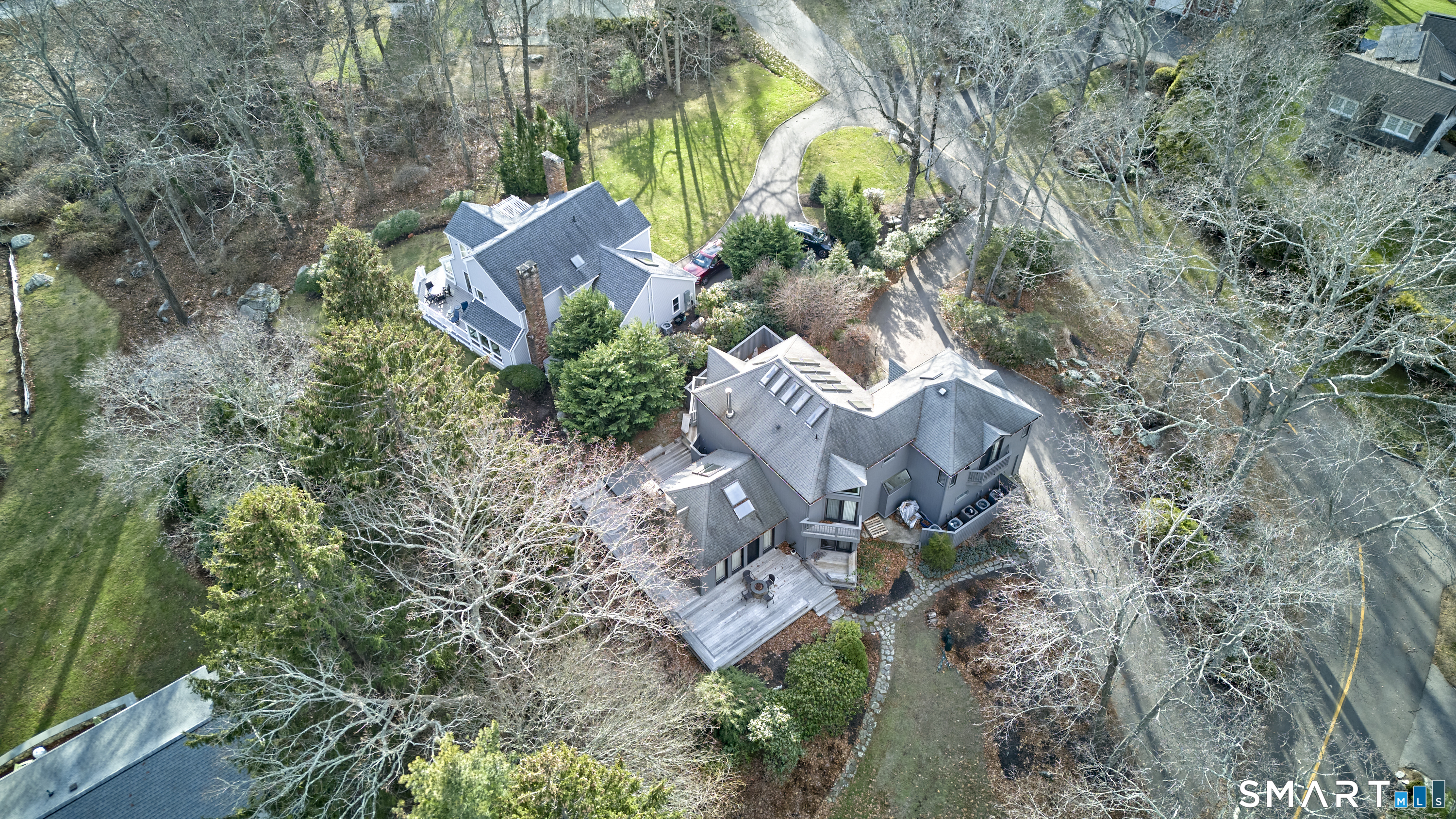 19 Money Point Road Stonington, CT 06355 - Photo 31 of 34 an aerial view of a house with a yard and outdoor seating