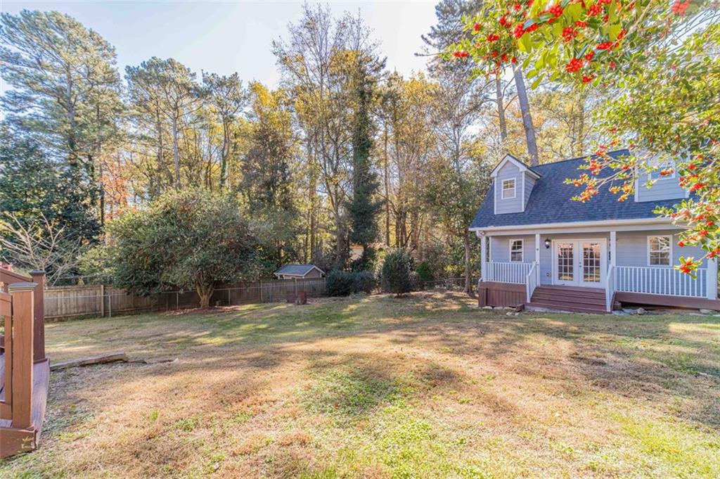 565 James Street Southwest Lilburn, GA 30047 - Photo 48 of 67 a view of a house with a yard