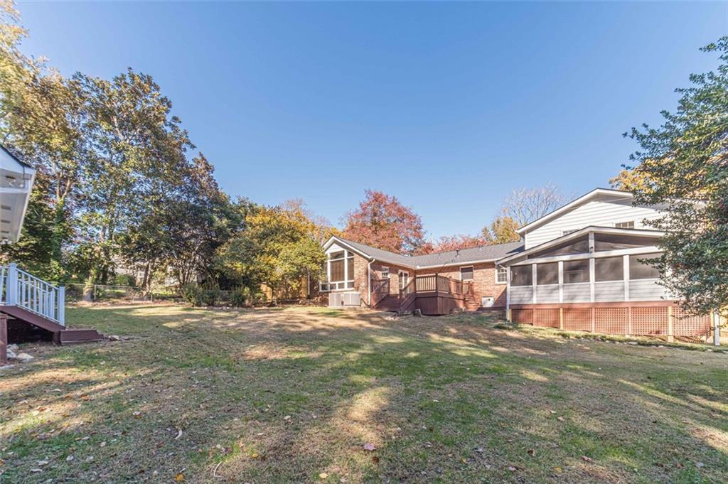 565 James Street Southwest Lilburn, GA 30047 - Photo 58 of 67 a view of a house with a yard