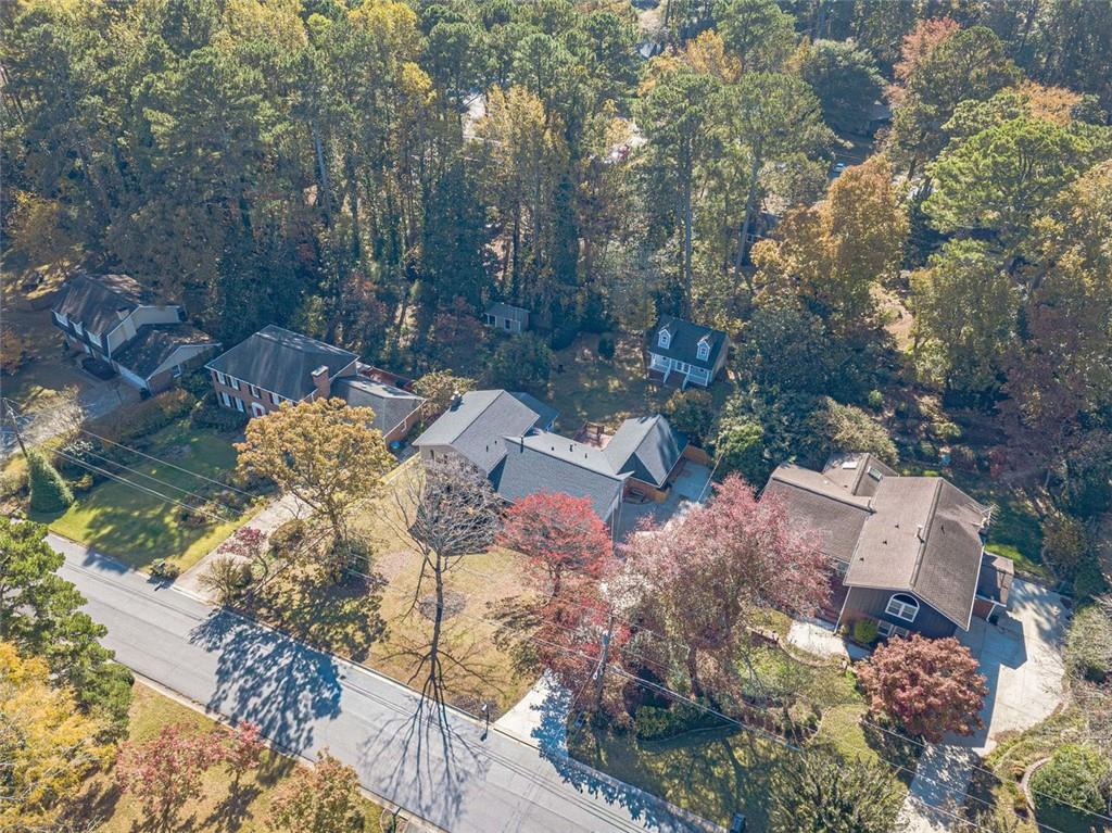 565 James Street Southwest Lilburn, GA 30047 - Photo 65 of 67 an aerial view of a house with a yard and large tree