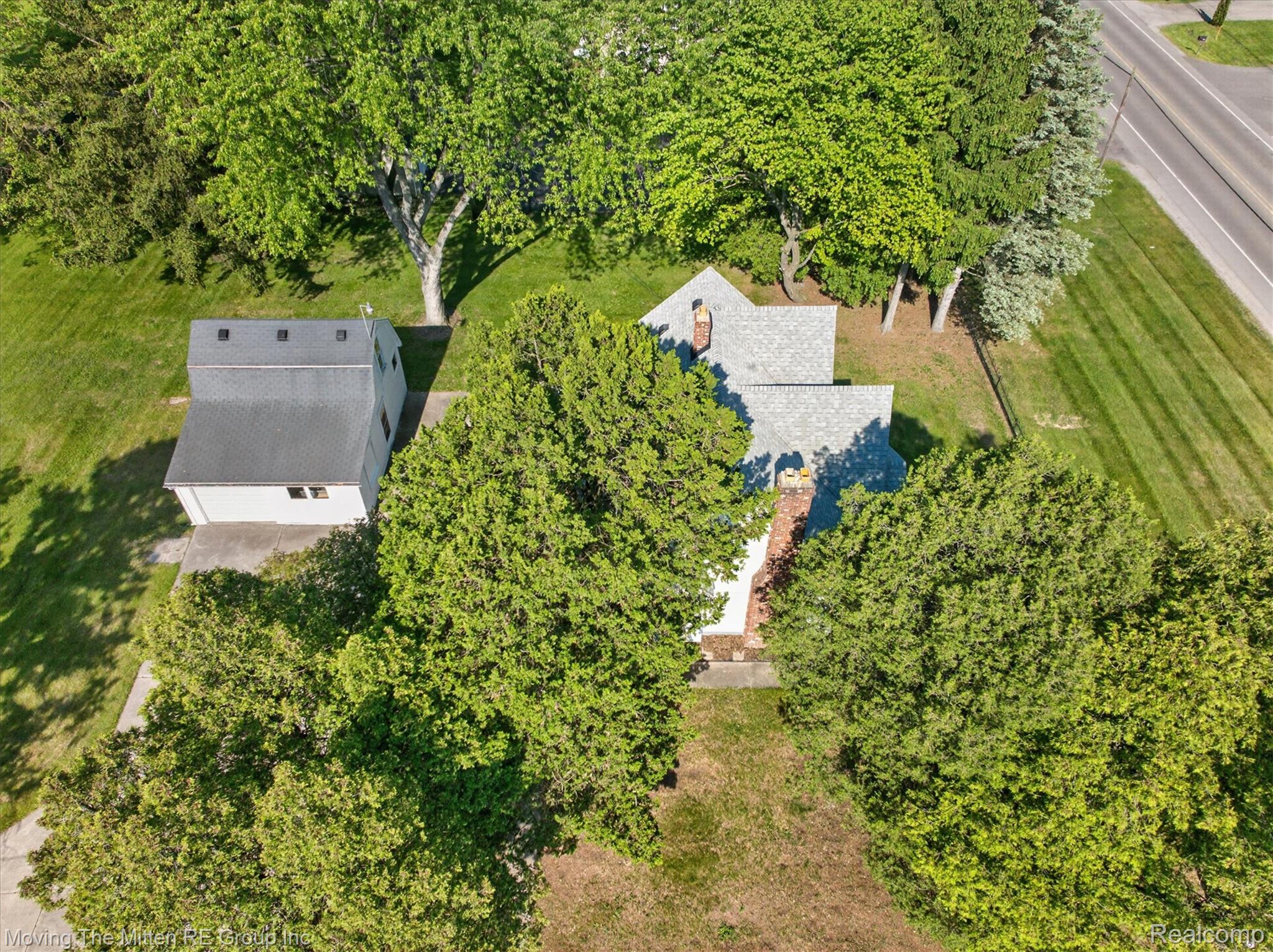 25505 Wick Road Taylor, MI 48180 - Photo 57 of 68 View of subject property with a tree filled landscape