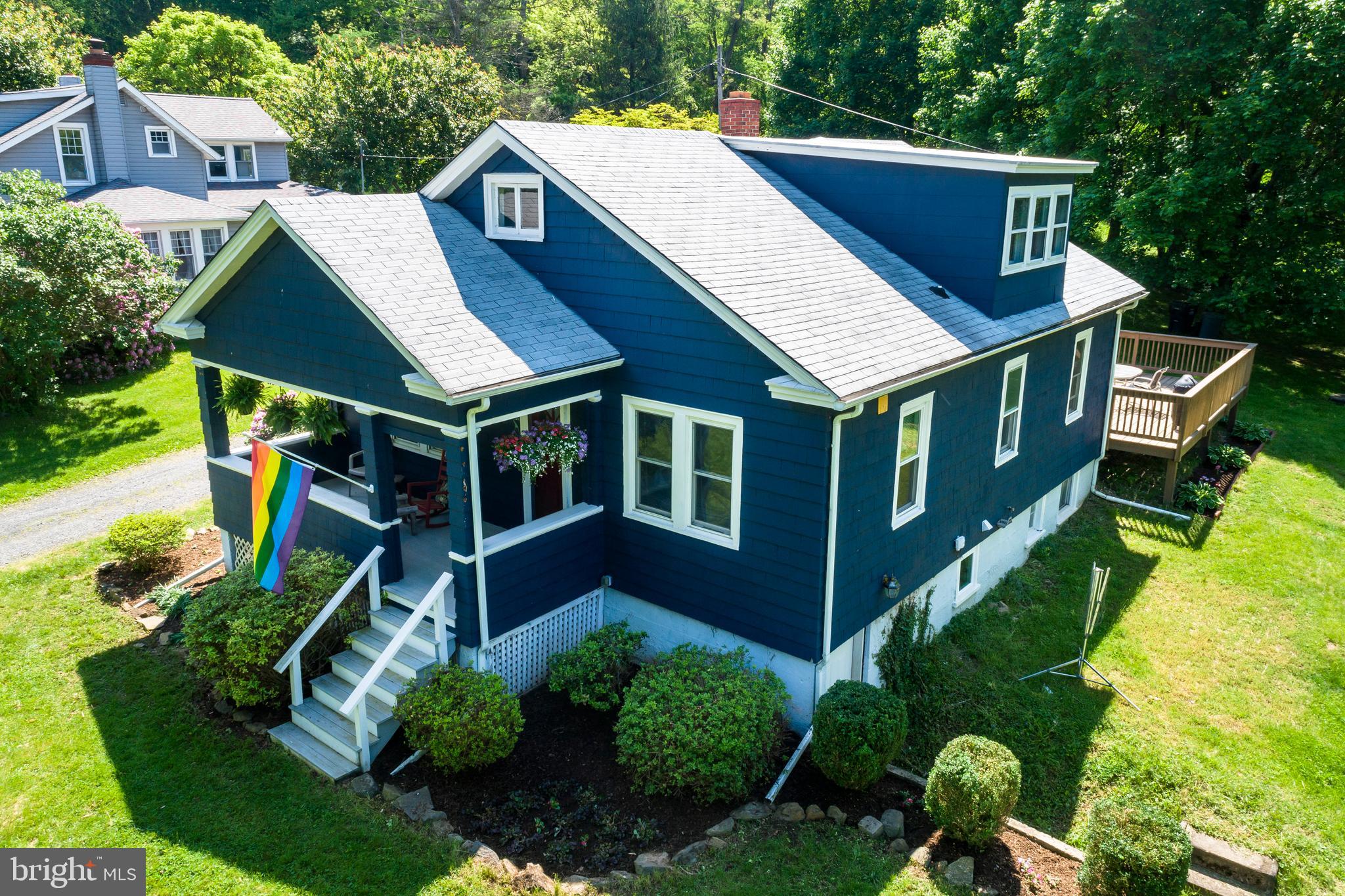 2190 School Road Pottstown, PA 19465 - Photo 1 of 30 an aerial view of a house with a yard and potted plants