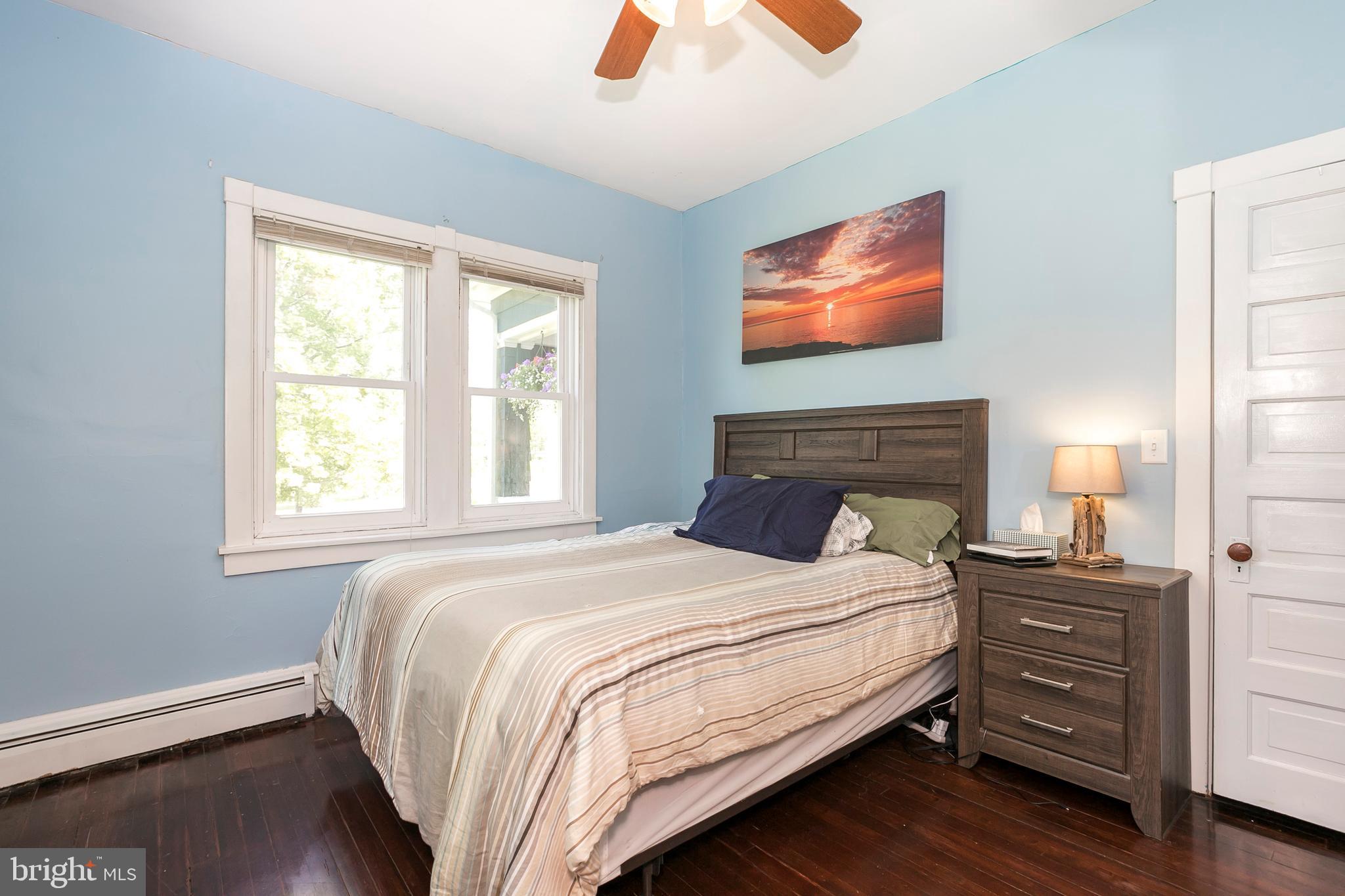 2190 School Road Pottstown, PA 19465 - Photo 15 of 30 a bedroom with a bed and a flat screen tv