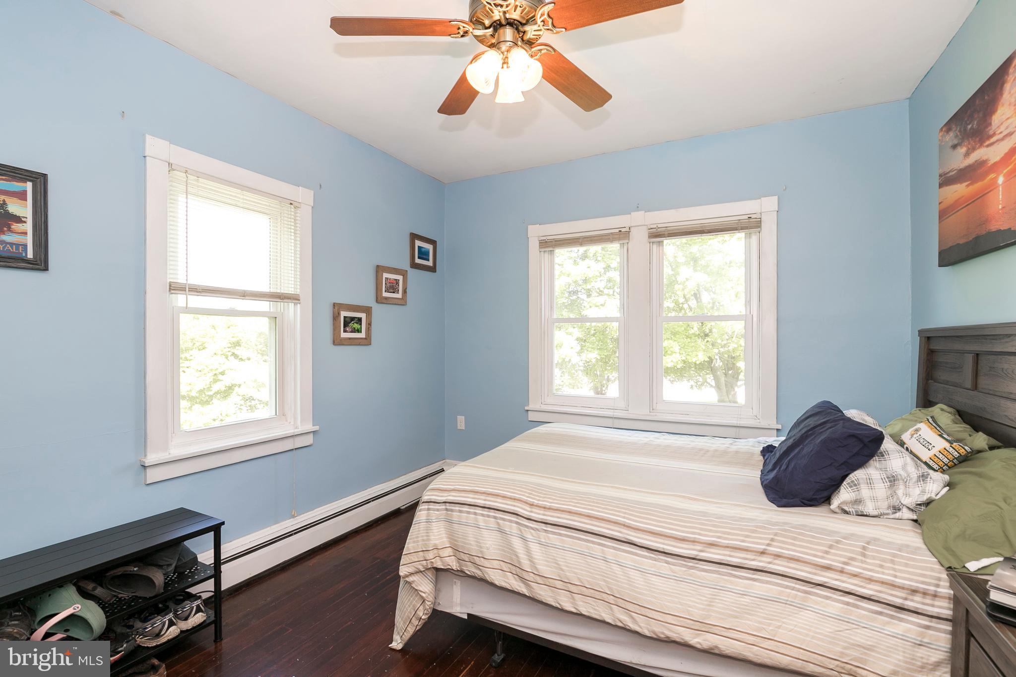 2190 School Road Pottstown, PA 19465 - Photo 16 of 30 a bedroom with a bed and a window