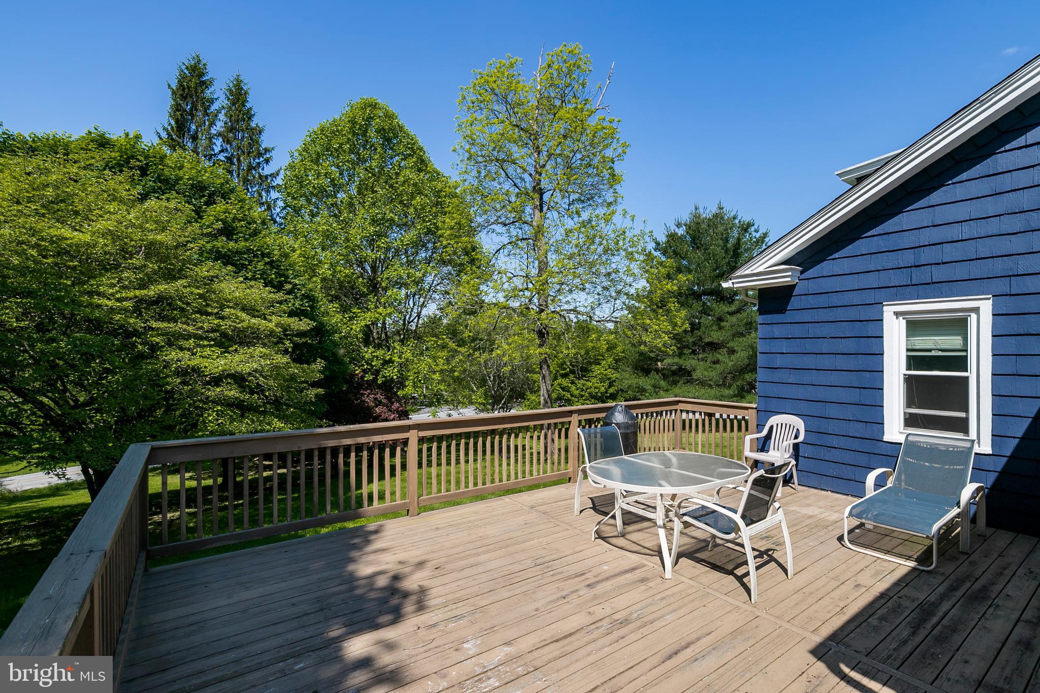 2190 School Road Pottstown, PA 19465 - Photo 21 of 30 a view of house with outdoor seating and wooden floor