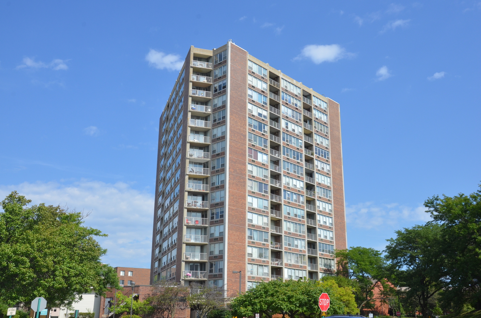 3925 Triumvera Drive, Unit 12E Glenview, IL 60025 - Photo 1 of 1 a front view of a building