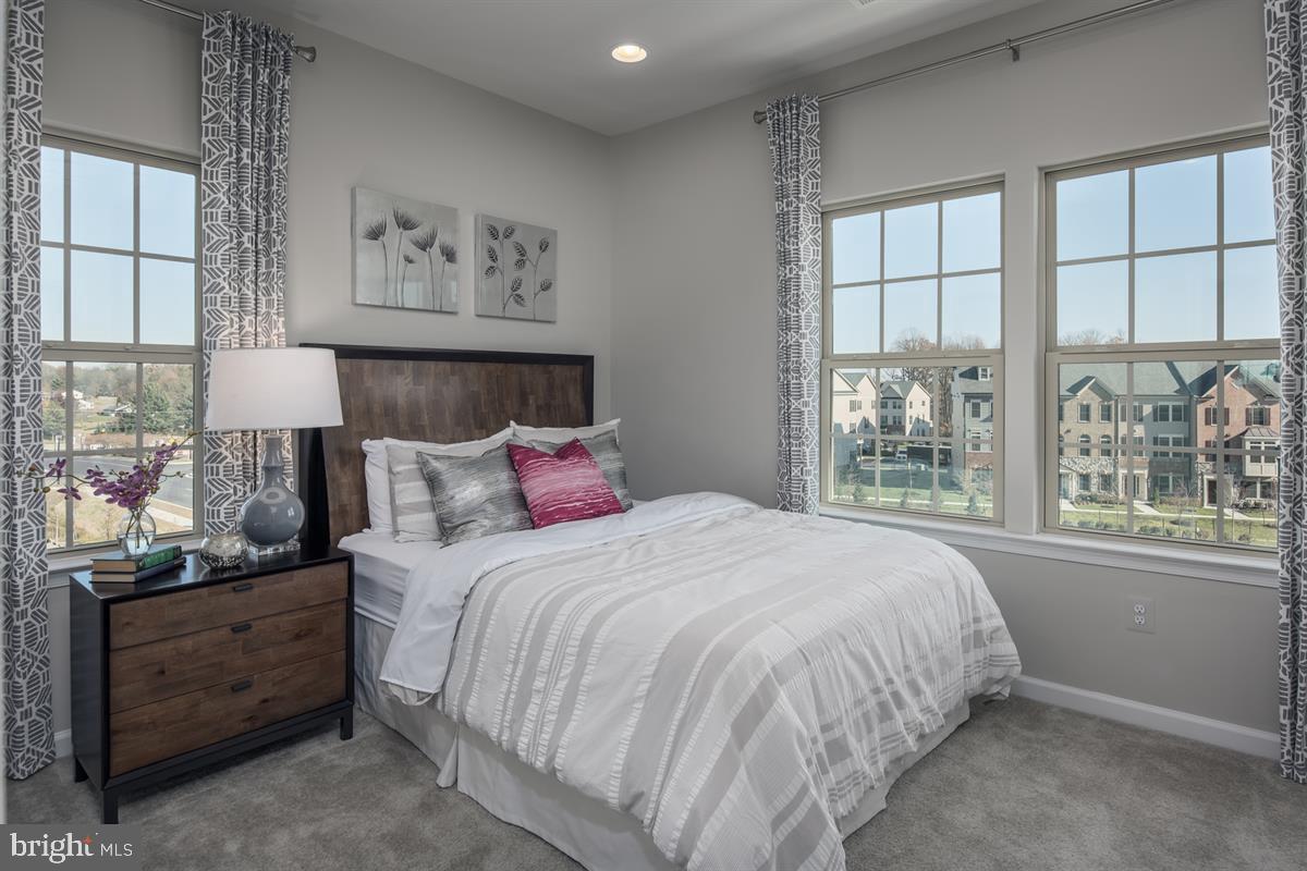 3003 Frayser Farm Road Hanover, MD 21076 - Photo 13 of 19 a bedroom with a large bed and a window