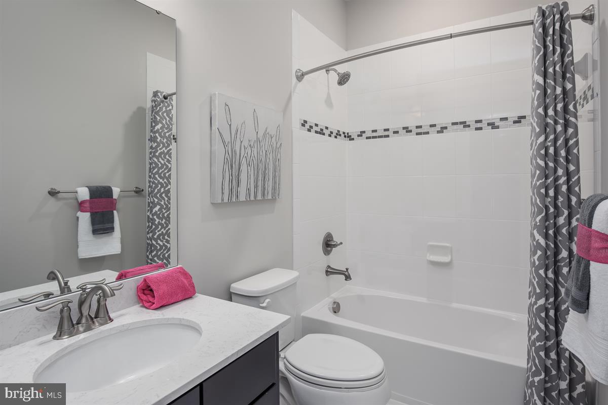 3003 Frayser Farm Road Hanover, MD 21076 - Photo 14 of 19 a bathroom with a sink toilet and shower