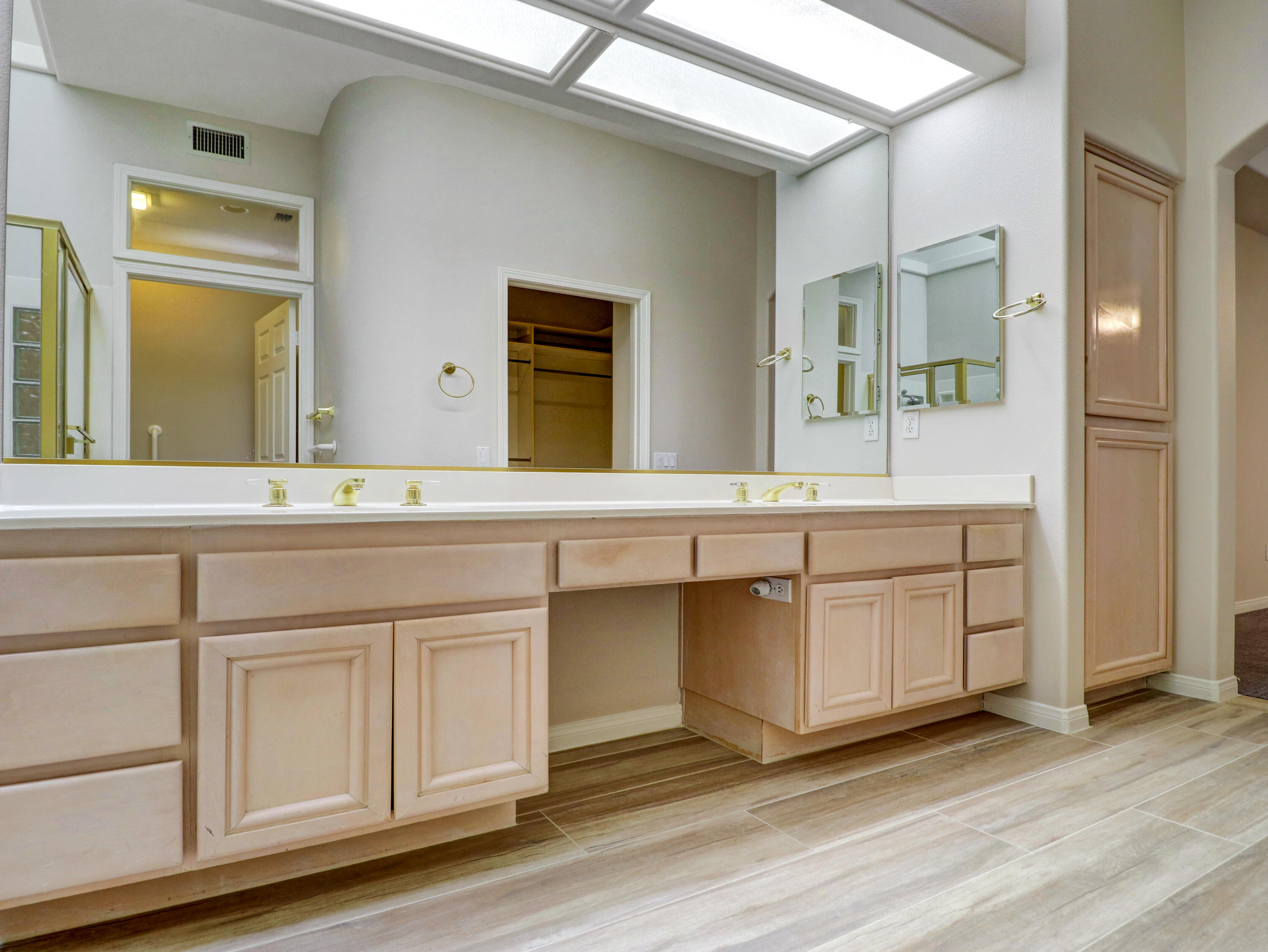 38574 Clear Sky Way Palm Desert, CA 92211 - Photo 26 of 69 a bathroom with a sink and a mirror