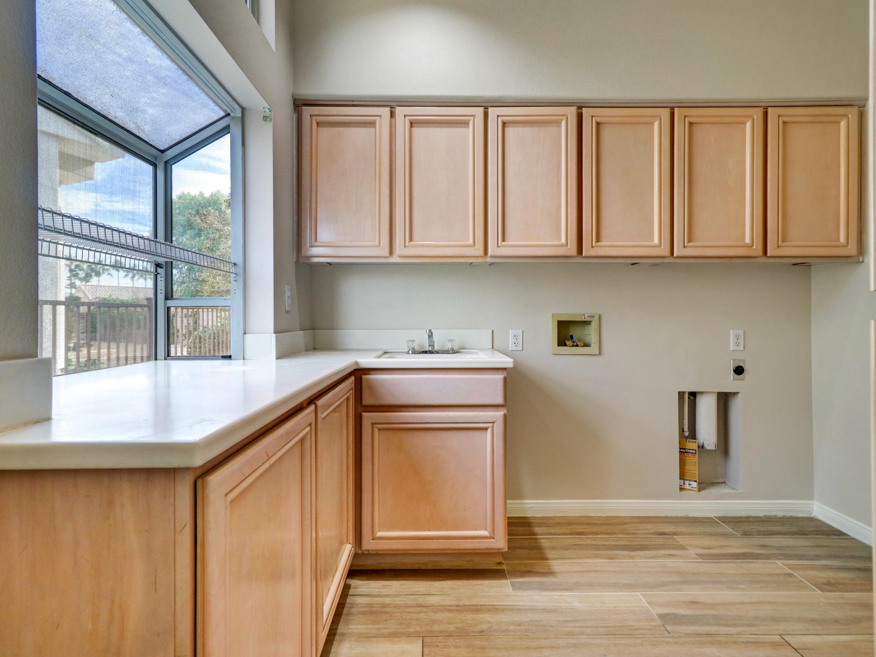 38574 Clear Sky Way Palm Desert, CA 92211 - Photo 29 of 69 a kitchen with stainless steel appliances granite countertop a refrigerator a stove and a sink with granite countertops