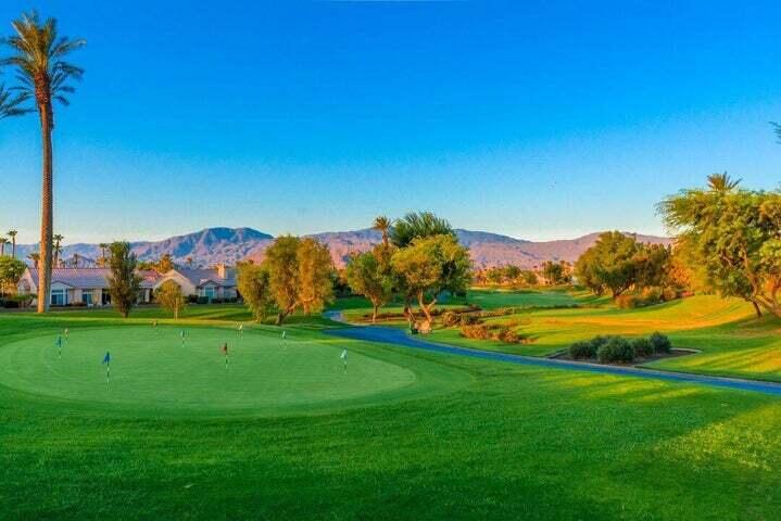 38574 Clear Sky Way Palm Desert, CA 92211 - Photo 51 of 69 a view of a golf course with a lake
