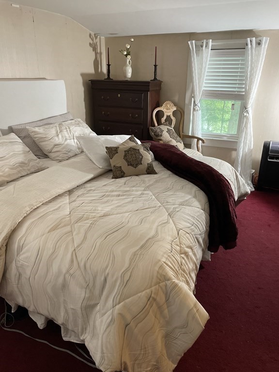 7 Marconi Drive Randolph, MA 02368 - Photo 11 of 24 a bedroom with a bed and window