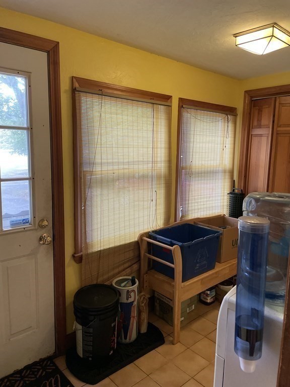 7 Marconi Drive Randolph, MA 02368 - Photo 13 of 24 a bedroom with a bed and a window