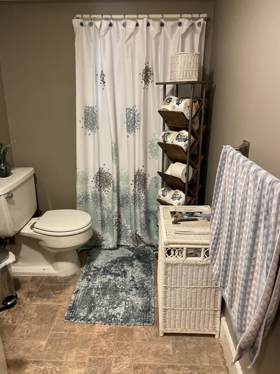 7 Marconi Drive Randolph, MA 02368 - Photo 19 of 24 a bathroom with a toilet and a sink