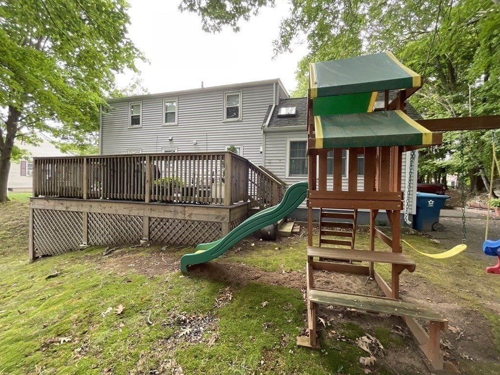 7 Marconi Drive Randolph, MA 02368 - Photo 23 of 24 a view of a house with backyard and sitting area