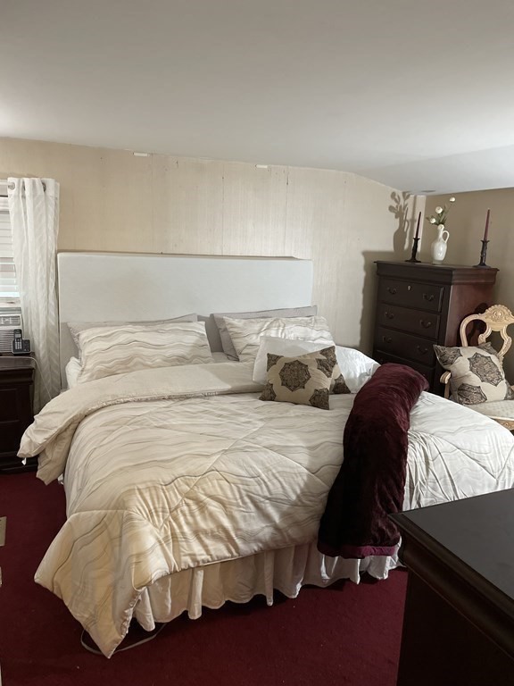 7 Marconi Drive Randolph, MA 02368 - Photo 9 of 24 a bedroom with a bed and window