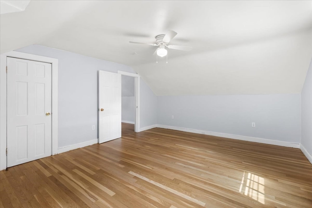 5 Marston Road Walpole, MA 02032 - Photo 20 of 36 a view of a livingroom with a fan