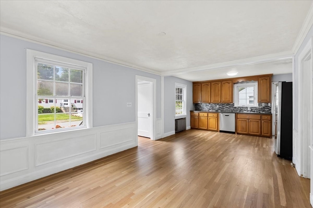 5 Marston Road Walpole, MA 02032 - Photo 6 of 36 a view of kitchen with wooden floor and electronic appliances