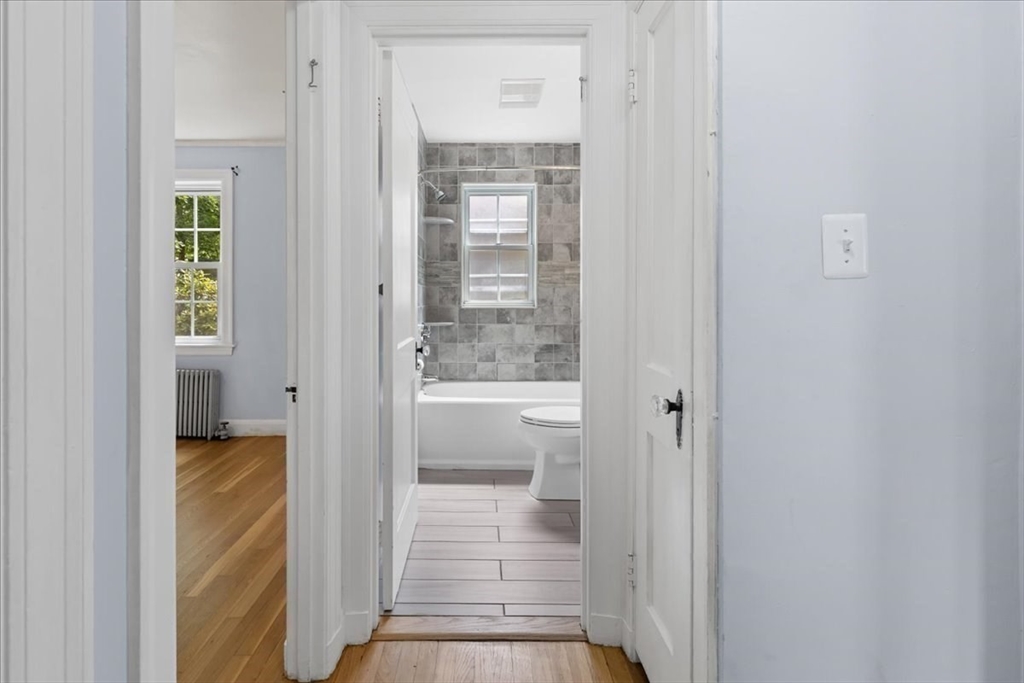5 Marston Road Walpole, MA 02032 - Photo 9 of 36 a bathroom with a bathtub