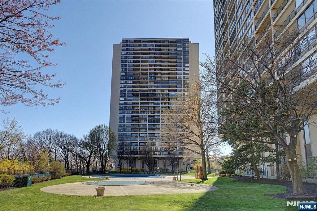 5 Horizon Road, Unit 2506 Fort Lee, NJ 07024 - Photo 18 of 20 a front view of a building with trees