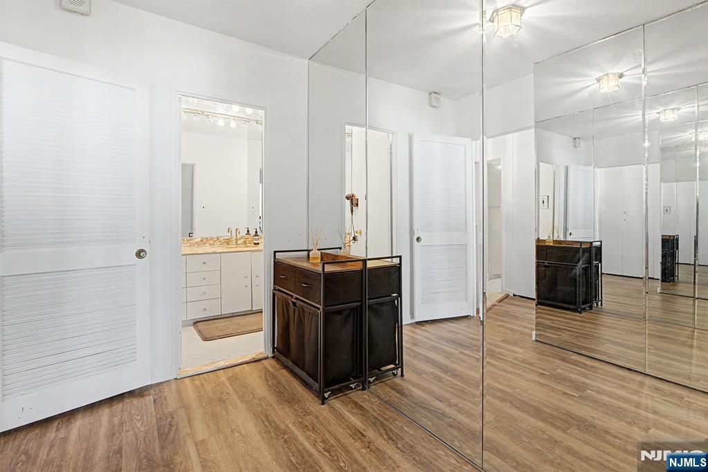 5 Horizon Road, Unit 2506 Fort Lee, NJ 07024 - Photo 8 of 20 a view of a room with wooden floor