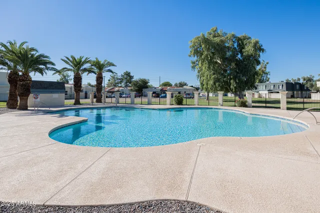 a view of a swimming pool and outdoor space