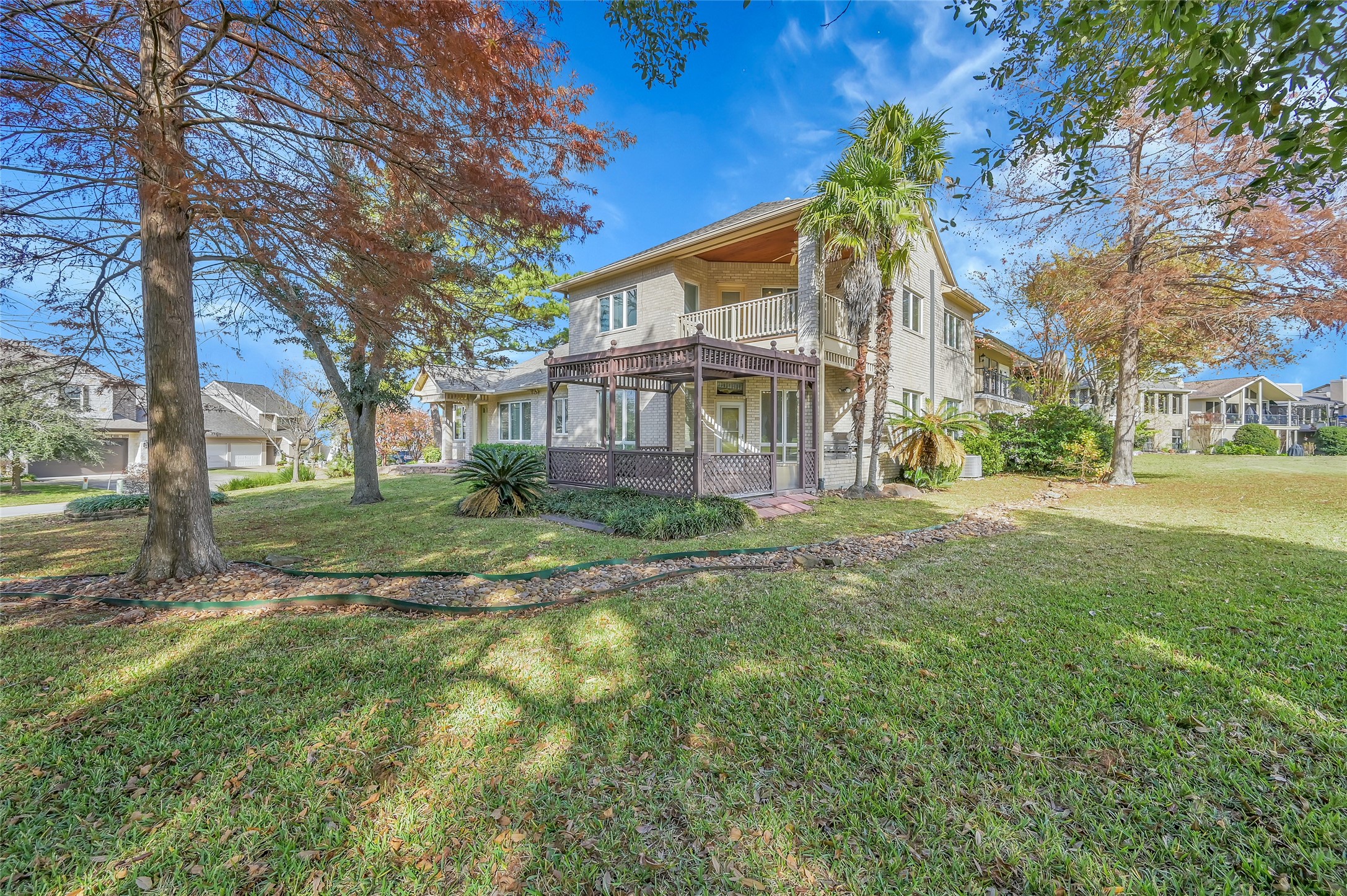 28 Waters Edge Street Conroe, TX 77356 - Photo 20 of 20 a view of a house with a big yard