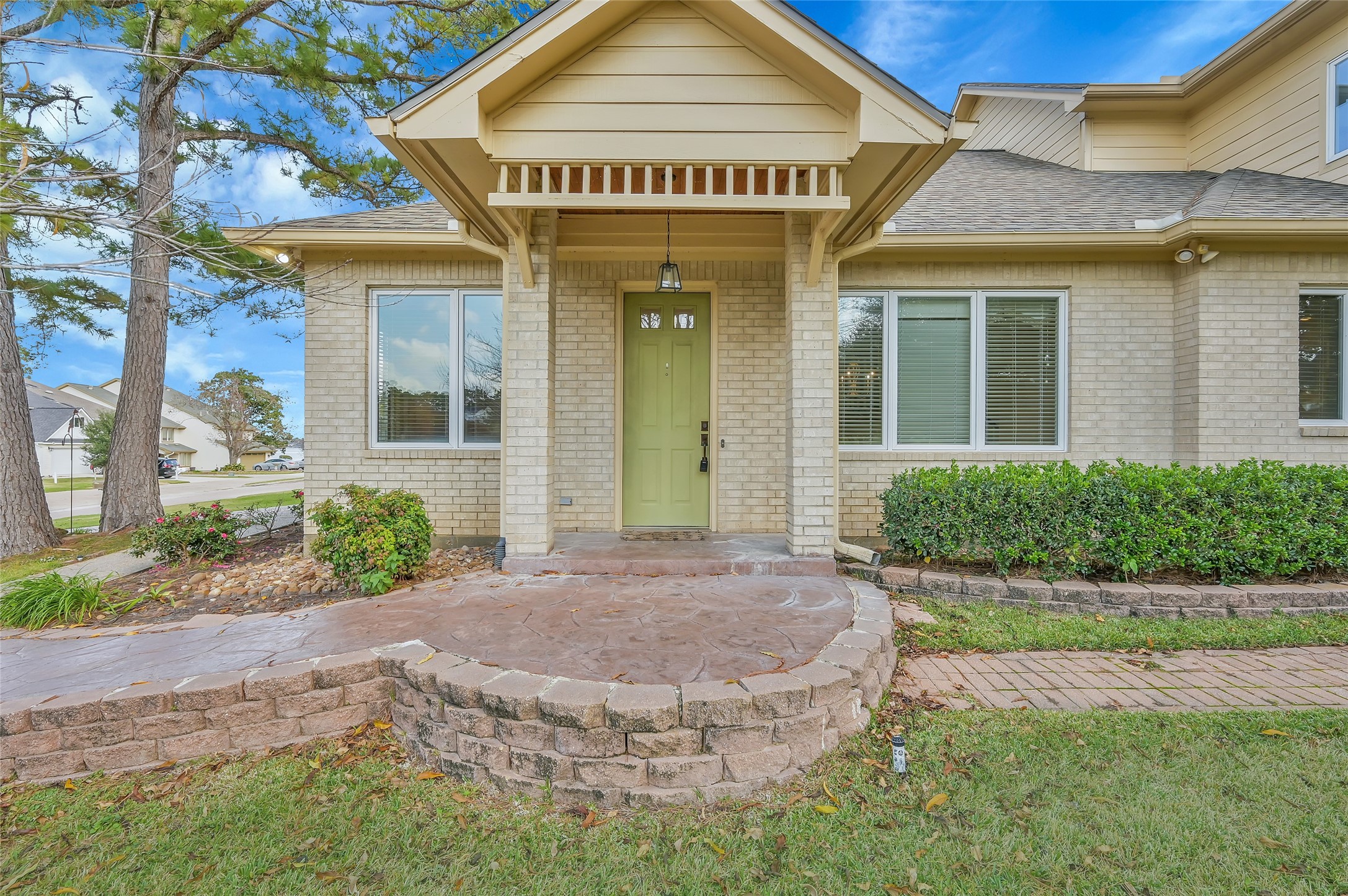 28 Waters Edge Street Conroe, TX 77356 - Photo 2 of 20 a view of a house with brick walls
