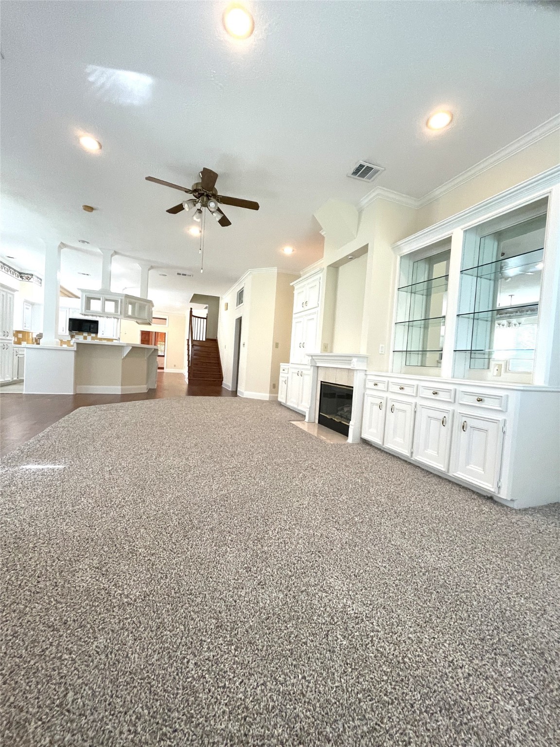 28 Waters Edge Street Conroe, TX 77356 - Photo 6 of 20 a large kitchen with kitchen island a sink stainless steel appliances and a cabinets