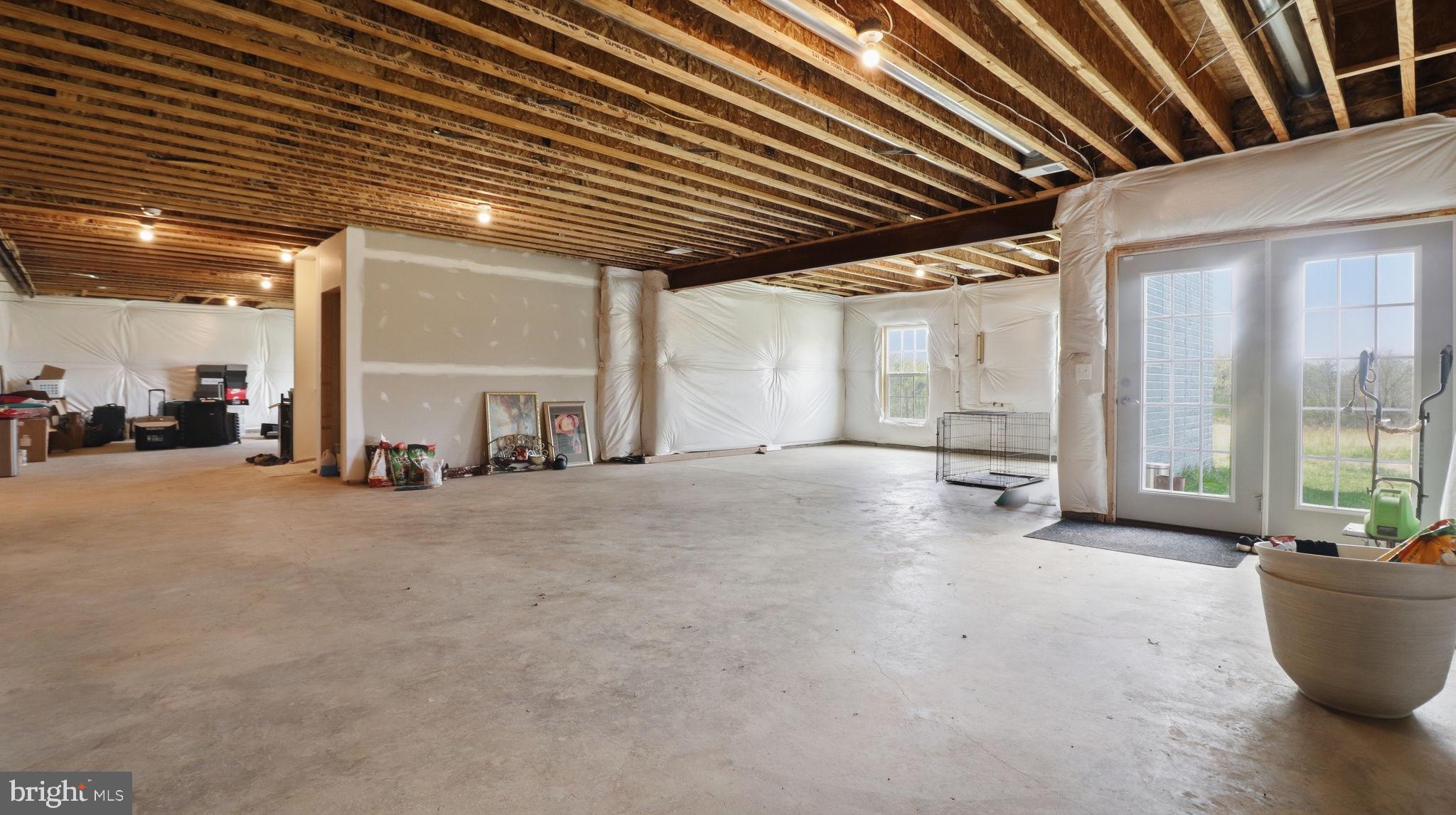 11502 Aden Road Nokesville, VA 20181 - Photo 101 of 106 a view of a livingroom with furniture and floor to ceiling window
