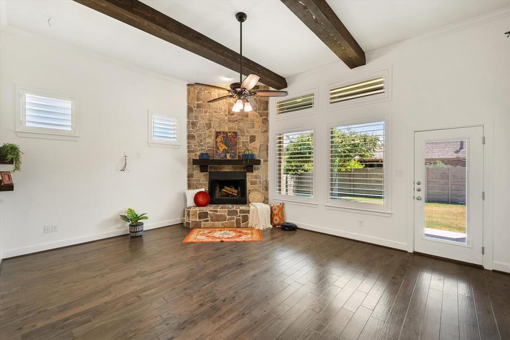 1201 9th Street Argyle, TX 76226 - Photo 14 of 40 a view of empty room with wooden floor and fan