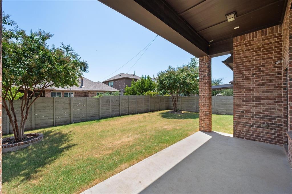 1201 9th Street Argyle, TX 76226 - Photo 31 of 40 a view of a backyard