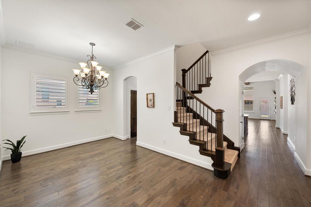 1201 9th Street Argyle, TX 76226 - Photo 7 of 40 a view of entryway and hall with wooden floor