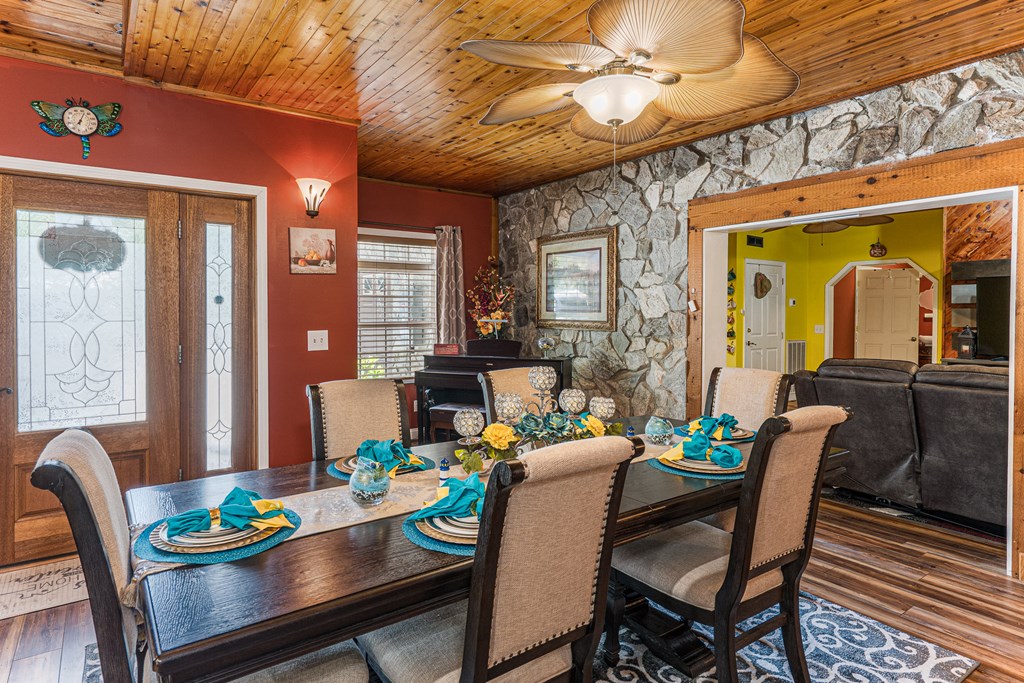 140 Kathryn Circle Murphy, NC 28906 - Photo 12 of 55 a view of a dining room with furniture window and wooden floor