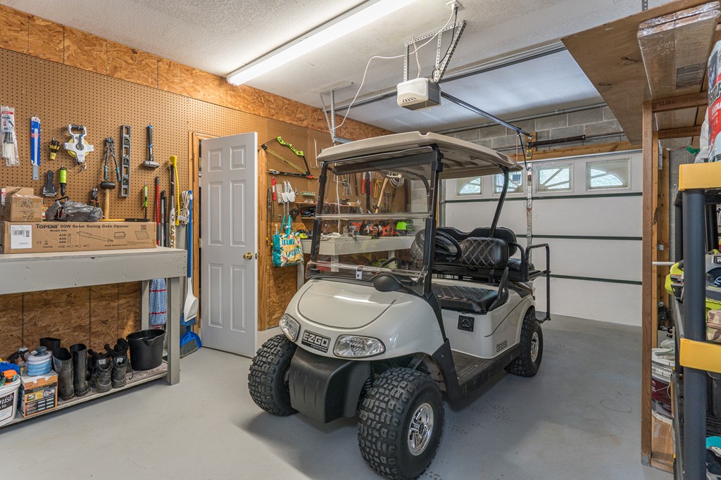 140 Kathryn Circle Murphy, NC 28906 - Photo 23 of 55 a car and bike parked in a room