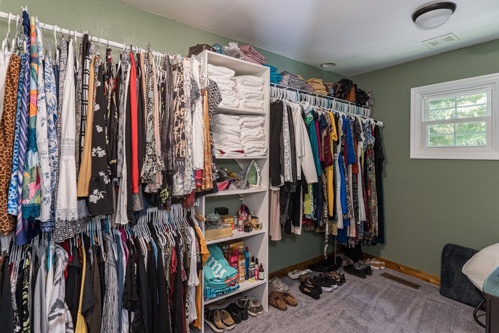 140 Kathryn Circle Murphy, NC 28906 - Photo 31 of 55 a view of walk in closet with clothes