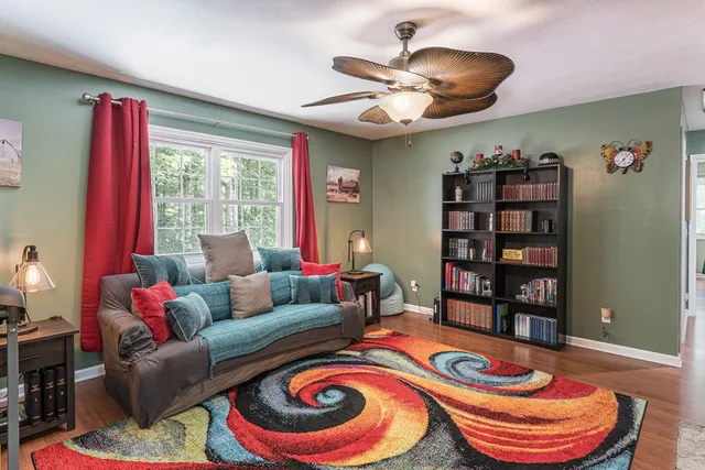 a view of a workspace with furniture