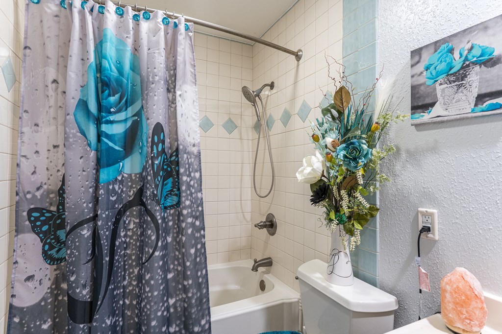 140 Kathryn Circle Murphy, NC 28906 - Photo 35 of 55 a bathroom with a toilet and a shower curtain