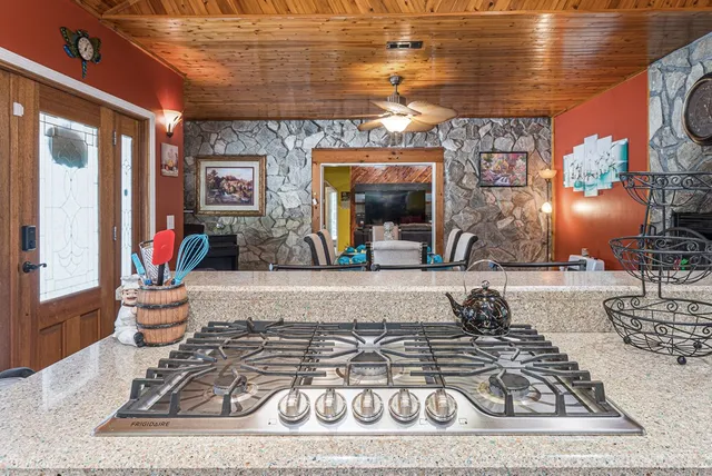 a view of balcony with furniture and wooden deck
